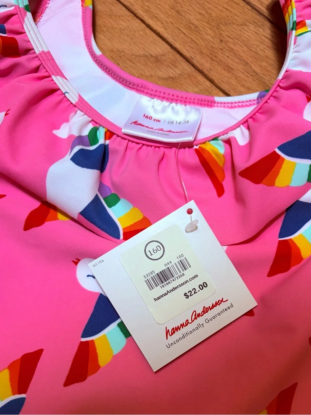 Hanna Andersson tankini with ruffle.  Pink Rainbow Bird graphic size160 (14-16)